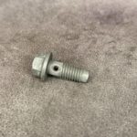 3819957-bolt-forsunki-ohlazhdeniya-porshnya.jpg